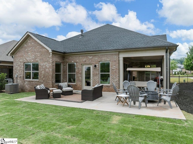 115 Harbor Master Ln, Taylors, SC 29687 - rear view of property with brick siding, an outdoor living space with a fire pit, roof with shingles, and a patio area