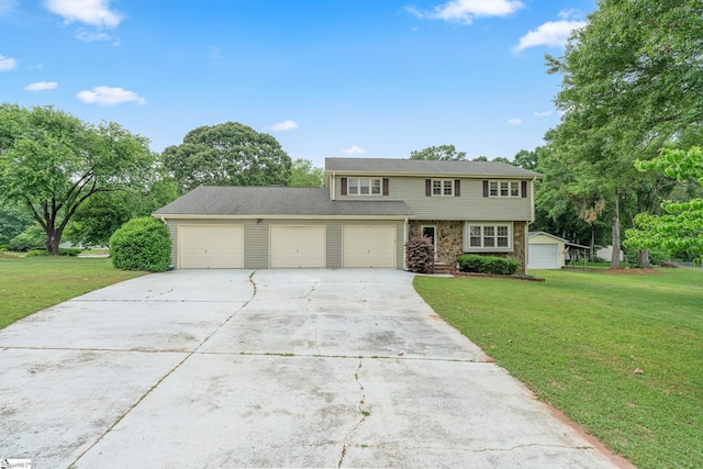 208 S Severn Cir, Easley, SC 29642 - view of front of home featuring a front yard, driveway, a garage, and stone siding