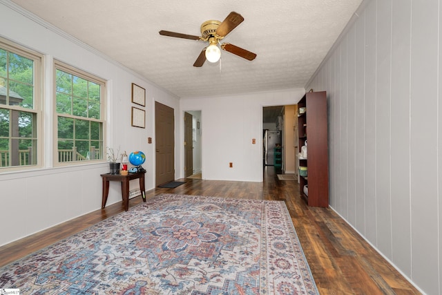 208 S Severn Cir, Easley, SC 29642 - unfurnished room featuring wood finished floors, ceiling fan, ornamental molding, and a textured ceiling
