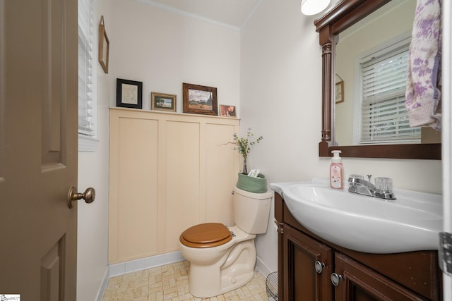 208 S Severn Cir, Easley, SC 29642 - bathroom featuring vanity, toilet, ornamental molding, and baseboards