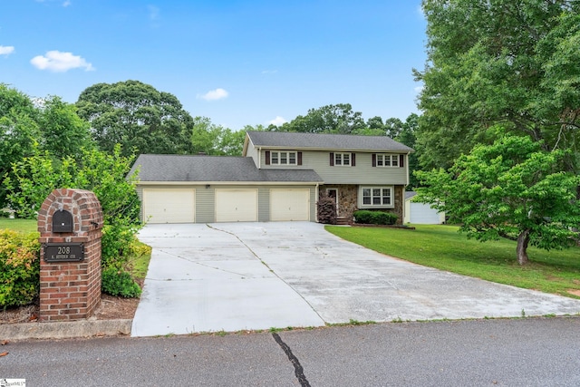 208 S Severn Cir, Easley, SC 29642 - colonial house featuring a front yard, driveway, a garage, and view of scattered trees
