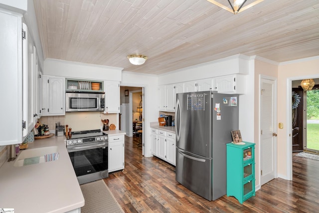 208 S Severn Cir, Easley, SC 29642 - kitchen with stainless steel appliances, ornamental molding, white cabinets, light countertops, and dark wood-style flooring