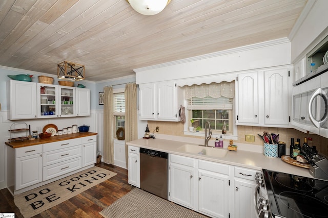 208 S Severn Cir, Easley, SC 29642 - kitchen with stainless steel appliances, a sink, crown molding, white cabinetry, and dark wood-type flooring