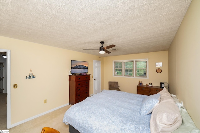 208 S Severn Cir, Easley, SC 29642 - bedroom featuring light colored carpet, a textured ceiling, ceiling fan, and baseboards