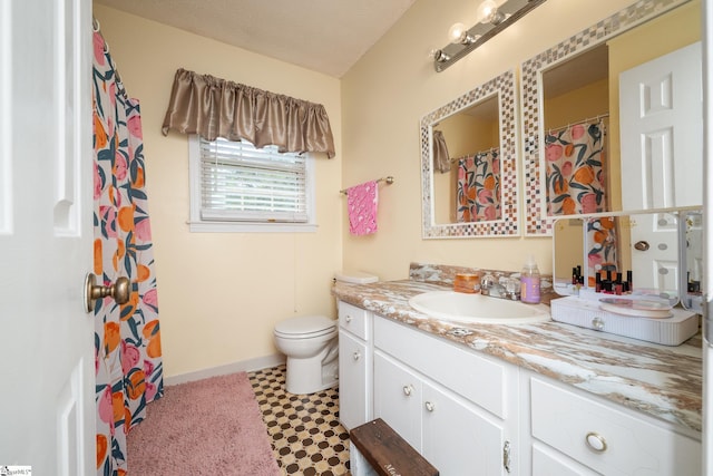 208 S Severn Cir, Easley, SC 29642 - full bath featuring vanity, toilet, baseboards, and tile patterned floors