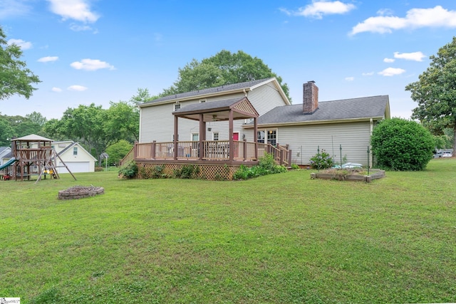 208 S Severn Cir, Easley, SC 29642 - rear view of property featuring a chimney, a lawn, a wooden deck, and a vegetable garden