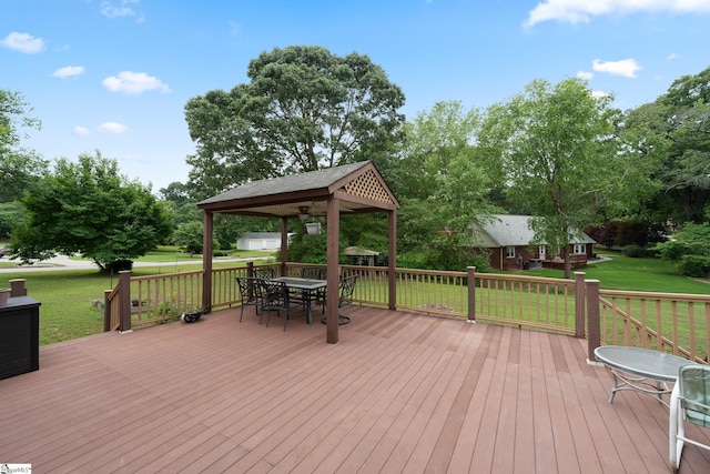 208 S Severn Cir, Easley, SC 29642 - wooden deck with a gazebo, a lawn, outdoor dining area, and view of scattered trees