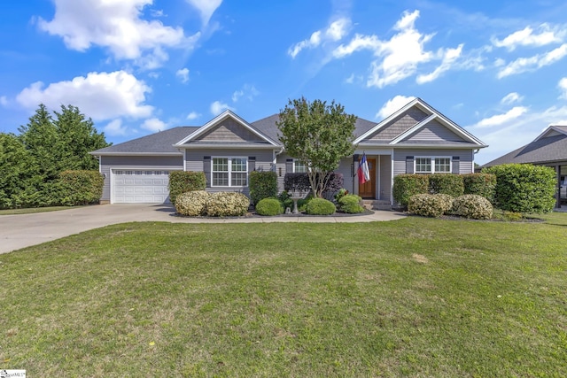 121 Lowe Rd, Piedmont, SC 29673 - view of front of home featuring concrete driveway, a garage, and a front lawn