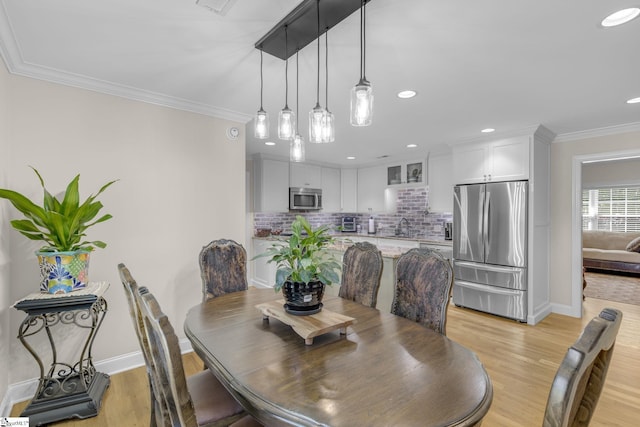 121 Lowe Rd, Piedmont, SC 29673 - dining space featuring baseboards, light wood-type flooring, crown molding, and recessed lighting