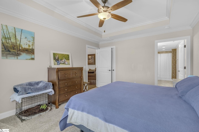 121 Lowe Rd, Piedmont, SC 29673 - bedroom with a raised ceiling, crown molding, a ceiling fan, light colored carpet, and baseboards