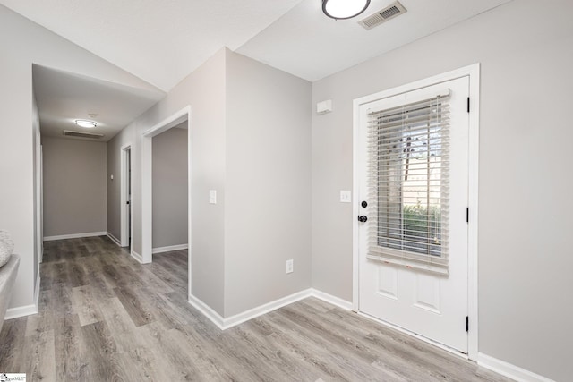 105 Queensland Ct, Fountain Inn, SC 29644 - foyer with light wood-type flooring, baseboards, and vaulted ceiling
