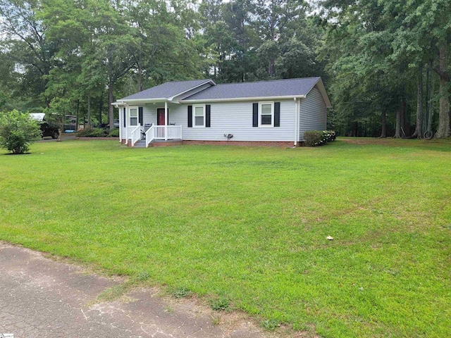 242 Lewis Rd, Williamston, SC 29697 - ranch-style home featuring a front yard and a shingled roof