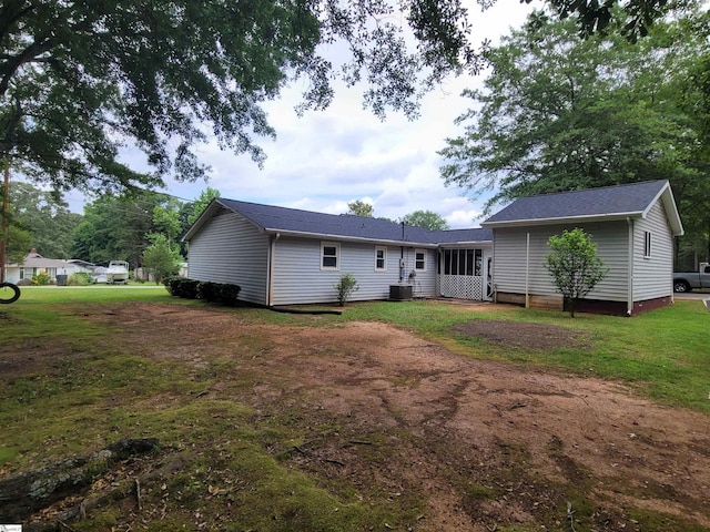 242 Lewis Rd, Williamston, SC 29697 - back of house featuring central AC unit and a lawn
