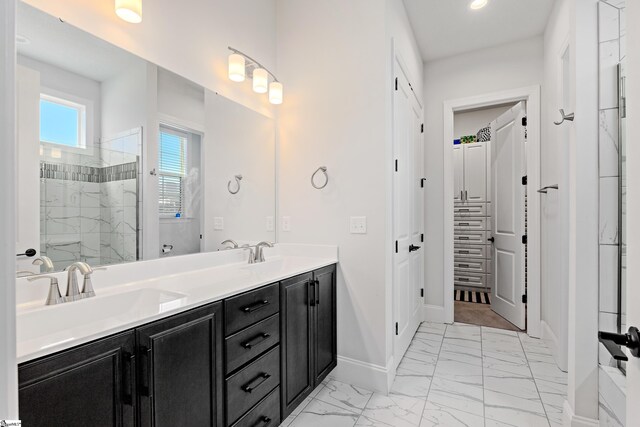 1 Winding Rock Rd, Simpsonville, SC 29680 - full bathroom featuring marble finish flooring, a walk in shower, double vanity, baseboards, and a closet