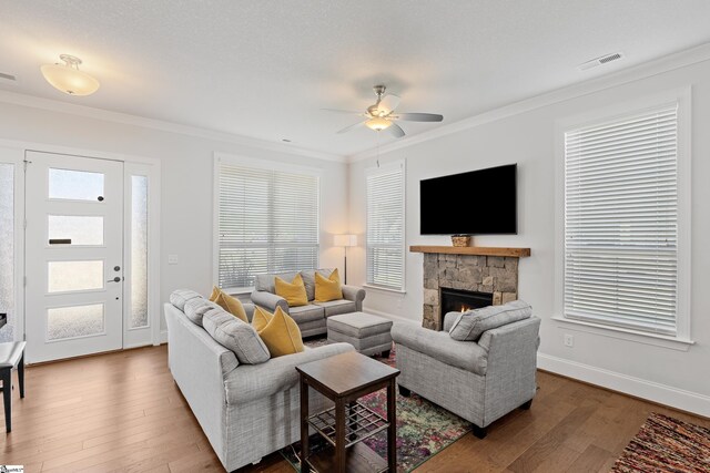 1 Winding Rock Rd, Simpsonville, SC 29680 - living room featuring a ceiling fan, hardwood / wood-style flooring, crown molding, a fireplace, and baseboards