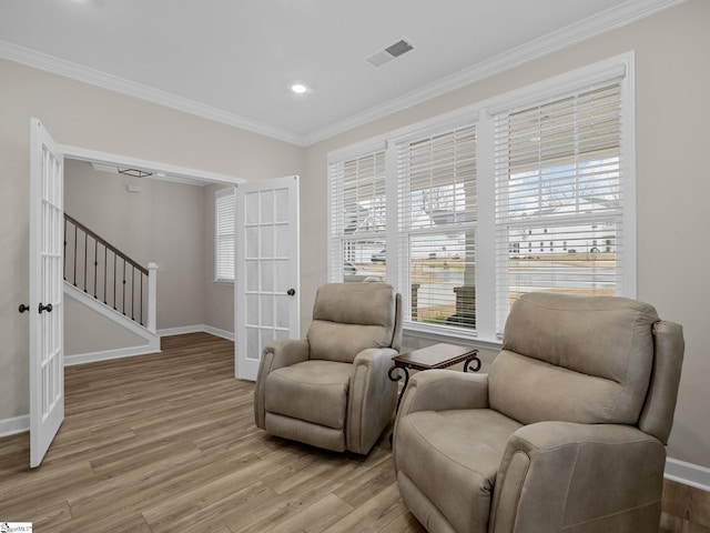 4427 Storehouse Run, Boiling Springs, SC 29316 - sitting room with french doors, light wood finished floors, crown molding, baseboards, and recessed lighting