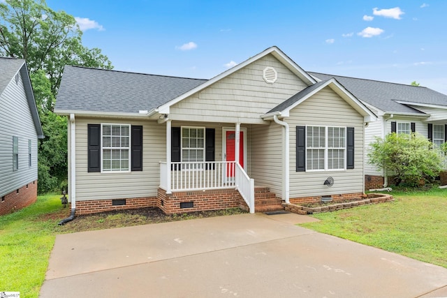 208 Cosmic Ct, Greer, SC 29651 - view of front of house with crawl space, covered porch, a front lawn, and a shingled roof