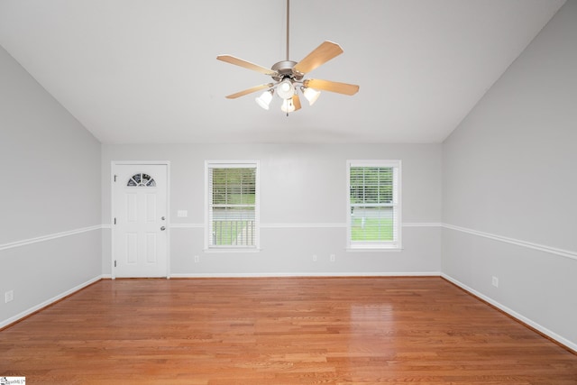 208 Cosmic Ct, Greer, SC 29651 - empty room with light wood-type flooring, ceiling fan, lofted ceiling, and baseboards