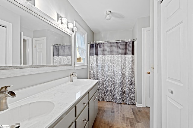 8 Nigh Oak Trce, Greer, SC 29651 - full bathroom with double vanity, wood finished floors, and a shower with shower curtain