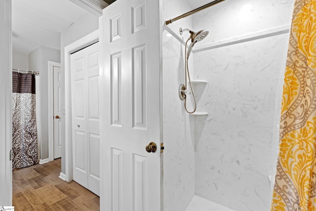 8 Nigh Oak Trce, Greer, SC 29651 - full bath with curtained shower, a closet, and wood finished floors
