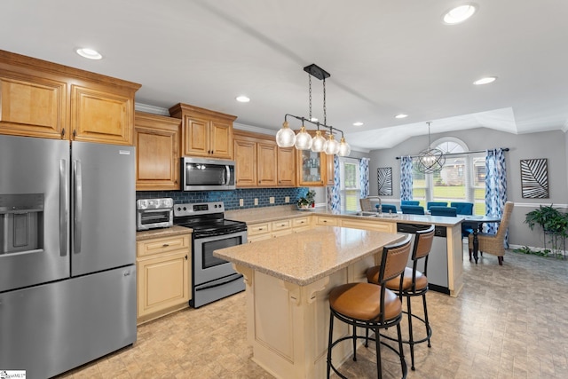 8 Nigh Oak Trce, Greer, SC 29651 - kitchen with stainless steel appliances, a peninsula, a breakfast bar, recessed lighting, and vaulted ceiling