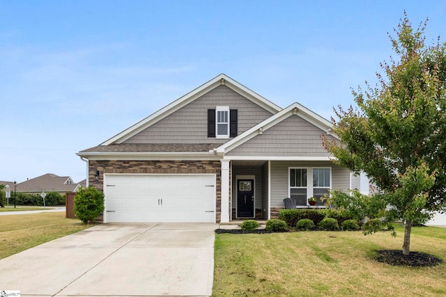 305 Kellen Ct, Duncan, SC 29334 - view of front of property with a front lawn, driveway, a garage, a porch, and stone siding