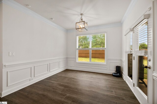 305 Kellen Ct, Duncan, SC 29334 - unfurnished dining area with a chandelier, dark wood-type flooring, a wainscoted wall, and ornamental molding