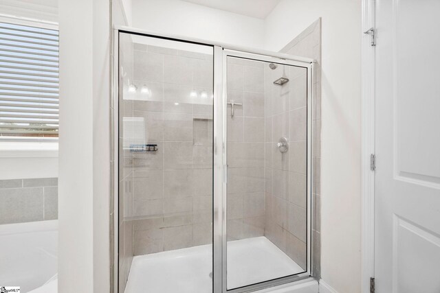 305 Kellen Ct, Duncan, SC 29334 - full bathroom featuring a stall shower and a bath