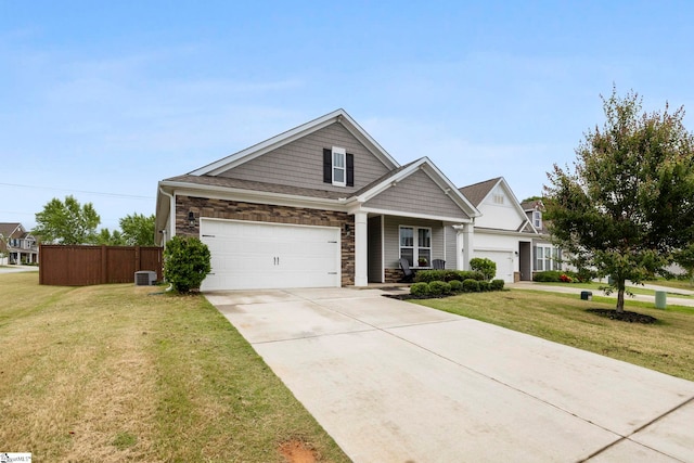 305 Kellen Ct, Duncan, SC 29334 - view of front of house with a garage, stone siding, and driveway