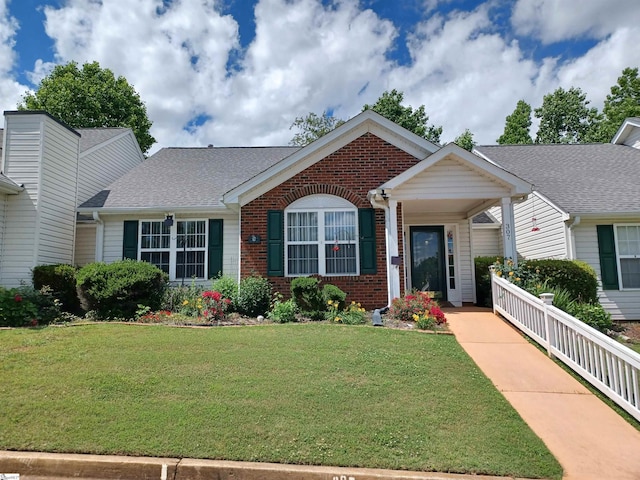 307 Weston Valley Dr, Moore, SC 29369 - view of front of home with brick siding and a front yard