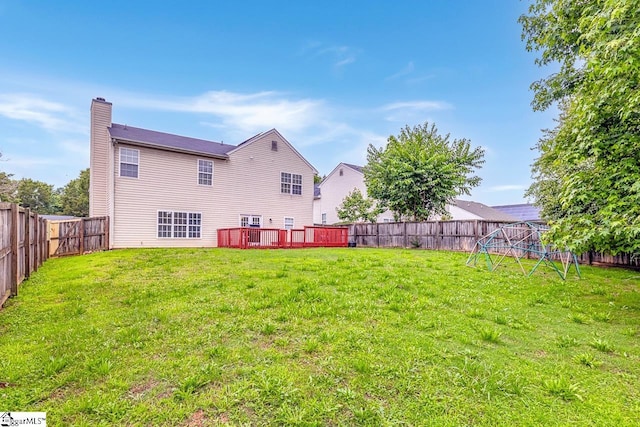 19 Hartwell Dr, Simpsonville, SC 29681 - rear view of property featuring a chimney, a wooden deck, and a playground