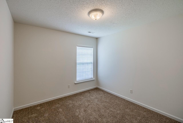 19 Hartwell Dr, Simpsonville, SC 29681 - empty room with carpet flooring, a textured ceiling, and baseboards