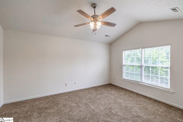 19 Hartwell Dr, Simpsonville, SC 29681 - unfurnished room featuring a ceiling fan, carpet floors, vaulted ceiling, baseboards, and a textured ceiling