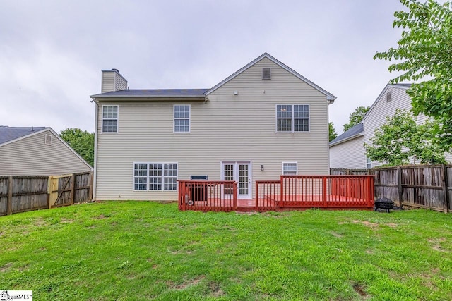 19 Hartwell Dr, Simpsonville, SC 29681 - rear view of house with a chimney and a wooden deck
