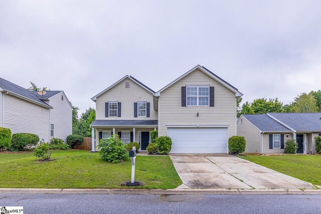 19 Hartwell Dr, Simpsonville, SC 29681 - traditional home with an attached garage, concrete driveway, and a front lawn