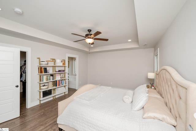 881 Cothran Rd, Inman, SC 29349 - bedroom with wood finished floors, recessed lighting, a raised ceiling, baseboards, and a spacious closet