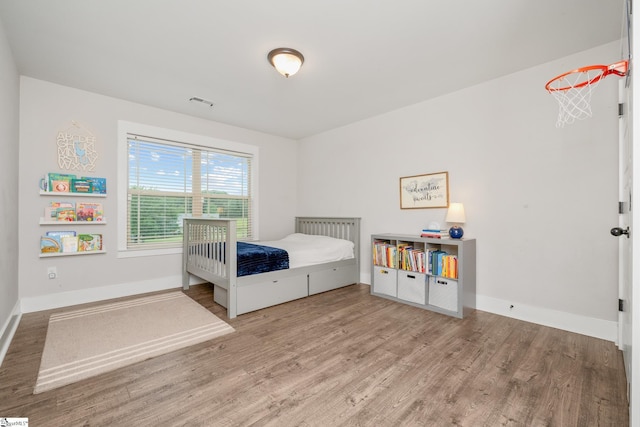 881 Cothran Rd, Inman, SC 29349 - bedroom featuring wood finished floors and baseboards