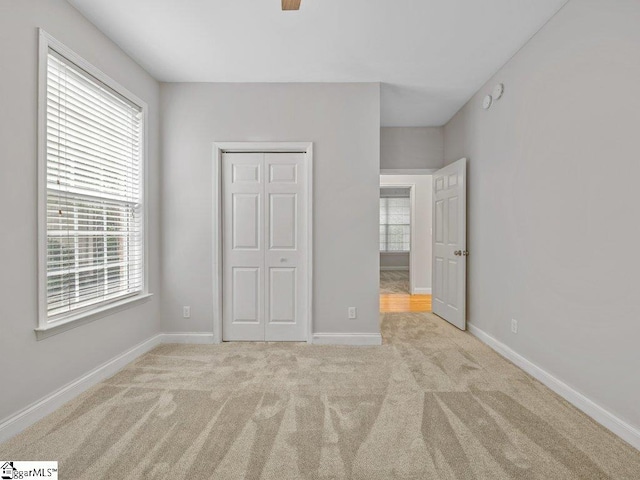 251 Saddlebrook Dr, Moore, SC 29369 - unfurnished bedroom with carpet floors, baseboards, and a closet