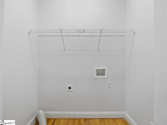 251 Saddlebrook Dr, Moore, SC 29369 - laundry room featuring electric dryer hookup, hookup for a washing machine, baseboards, and light wood-type flooring
