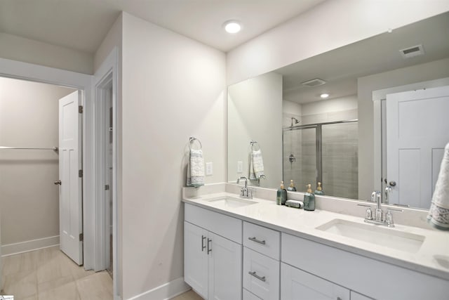 105 Boren Way, Greenville, SC 29607 - bathroom featuring baseboards, double vanity, a shower stall, and recessed lighting