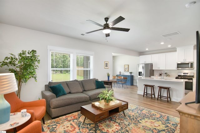 105 Boren Way, Greenville, SC 29607 - living room featuring light wood finished floors, recessed lighting, and a ceiling fan