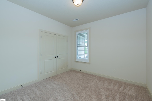 26 Bradstock Dr, Greer, SC 29650 - unfurnished bedroom with carpet floors, baseboards, and a closet