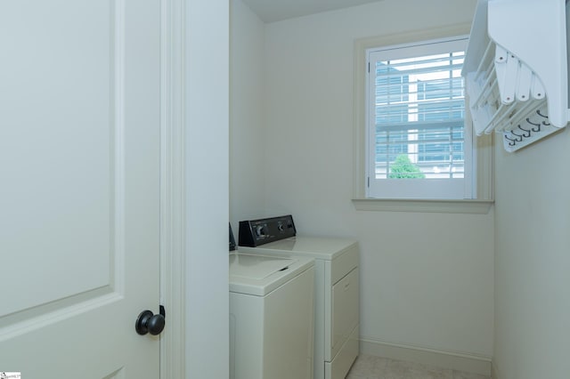 26 Bradstock Dr, Greer, SC 29650 - laundry area featuring washing machine and clothes dryer and baseboards