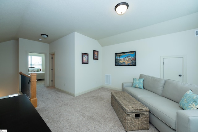 26 Bradstock Dr, Greer, SC 29650 - living area with lofted ceiling, light colored carpet, and baseboards