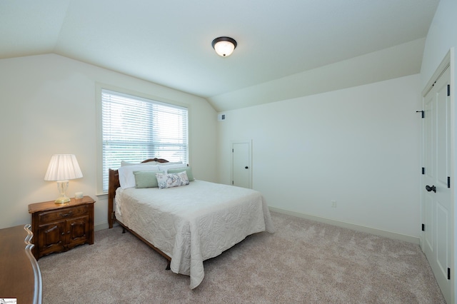 26 Bradstock Dr, Greer, SC 29650 - bedroom with vaulted ceiling, light colored carpet, and baseboards