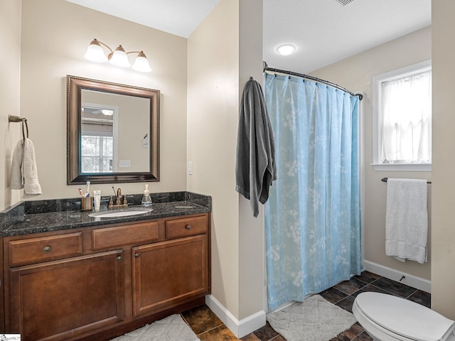 227 Heritage Creek Dr, Boiling Springs, SC 29316 - bathroom featuring vanity, toilet, baseboards, and a shower with curtain