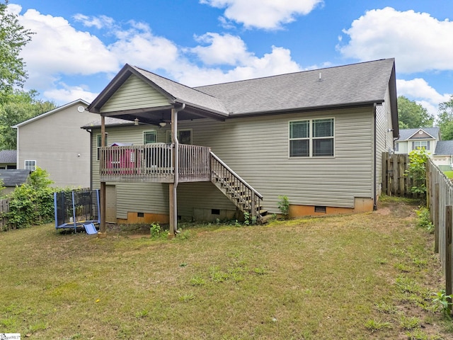 227 Heritage Creek Dr, Boiling Springs, SC 29316 - back of property featuring crawl space, a trampoline, a wooden deck, and stairway