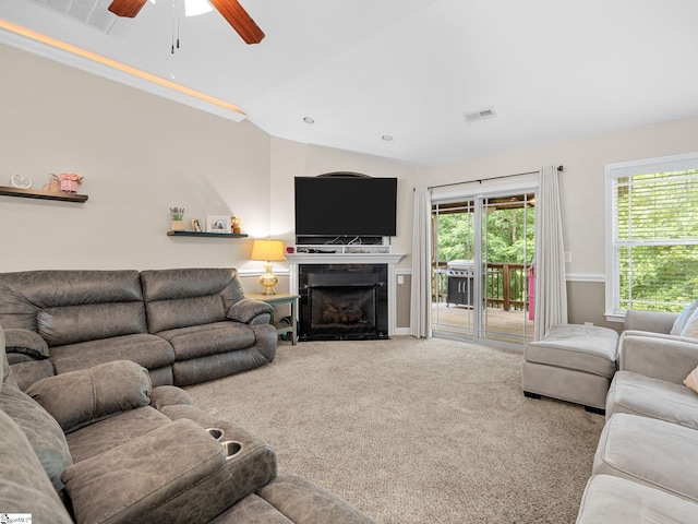 227 Heritage Creek Dr, Boiling Springs, SC 29316 - carpeted living room featuring ceiling fan, vaulted ceiling, healthy amount of natural light, and a fireplace with flush hearth