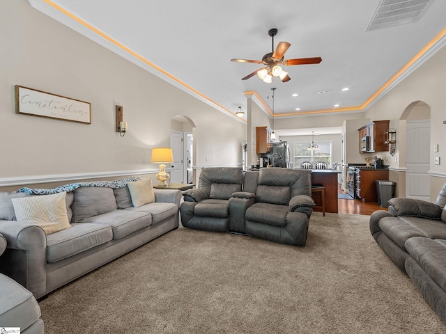 227 Heritage Creek Dr, Boiling Springs, SC 29316 - living area with arched walkways, ornamental molding, ceiling fan, wainscoting, and recessed lighting