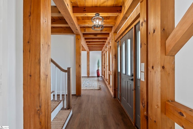 868 Old Hundred Rd, Pelzer, SC 29669 - hallway featuring wooden ceiling with exposed beams, stairs, dark wood-type flooring, and a chandelier